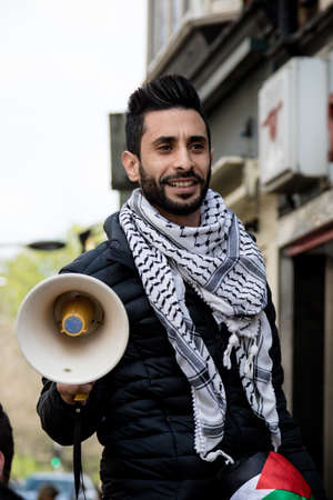 London, United Kingdom, 14th April 2018:- Protesters gather along Kensington High Street, near the Israeli Embassy in London to protest the ongoing occupation of Palestine.のeditorial素材