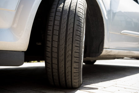Close up of tyres on a parked car