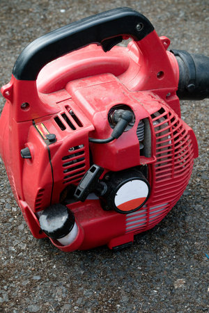 A petrol leaf blower for clearing large amounts of fallen leaves