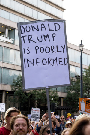 London, United Kingdom, 13th July 2018:Placards carried by anti Donald Trump protesters marching in...