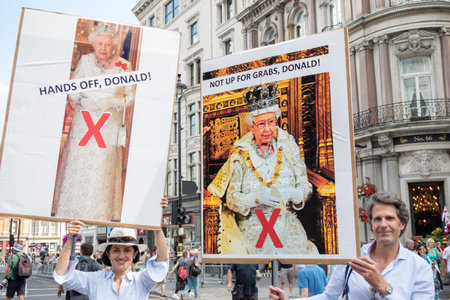 London, United Kingdom, 13th July 2018:Placards carried by anti Donald Trump protesters marching in...