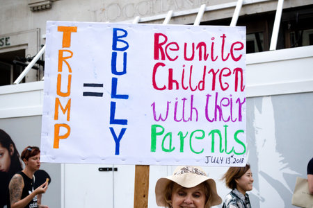 London, United Kingdom, 13th July 2018:Placards carried by anti Donald Trump protesters marching in...