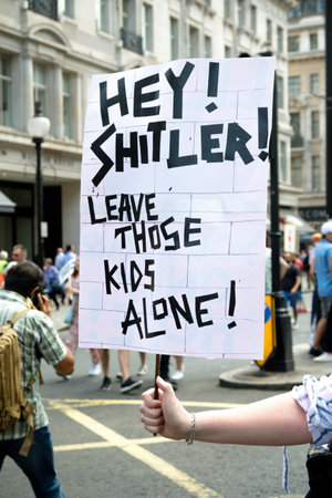 London, United Kingdom, 13th July 2018:Placards carried by anti Donald Trump protesters marching in...