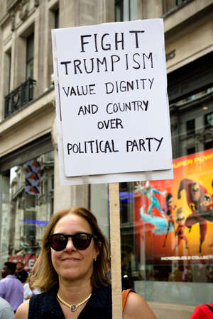 London, United Kingdom, 13th July 2018:Placards carried by anti Donald Trump protesters marching in central Londonのeditorial素材