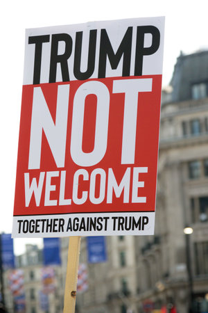 London, United Kingdom, 13th July 2018:Placards carried by anti Donald Trump protesters marching in...