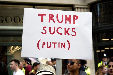 London, United Kingdom, 13th July 2018:Placards carried by anti Donald Trump protesters marching in...