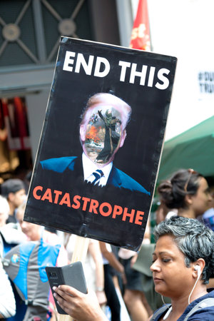London, United Kingdom, 13th July 2018:Placards carried by anti Donald Trump protesters marching in...