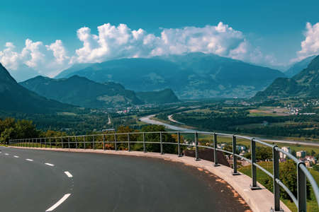 View of the landscape in the Alpine Principality of Liechtenstein across the border into Switzerlandの写真素材