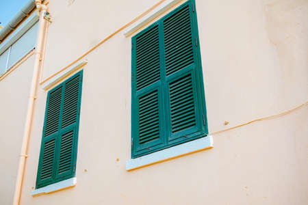 Shuttered windows in Gibraltar. Gibraltar is a British Overseas Territory located on the southern tip of Spain.の写真素材