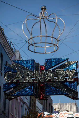 London, United Kingdom, November 17th:- Sign above Carnaby Street in the Soho area of London, famous since the 1960s for its independent fashion shops.のeditorial素材