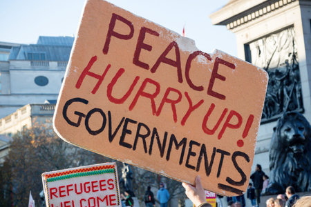 London, United Kingdom, November 17th:- A peace activist at the Stand Up To Racism march through...