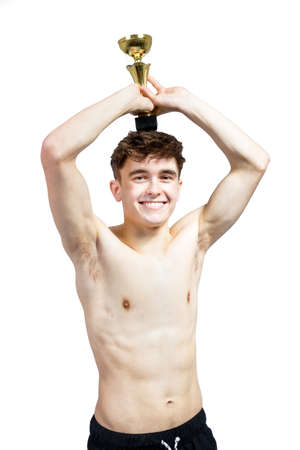 Successful caucasian young adult swimmer isolated on white background with awardの写真素材