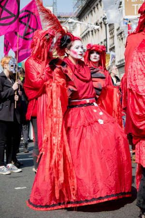 London, United Kingdom, 15th April 2019:- Extinction Rebellion protesters in Parliament Square, protesting about climate change.のeditorial素材
