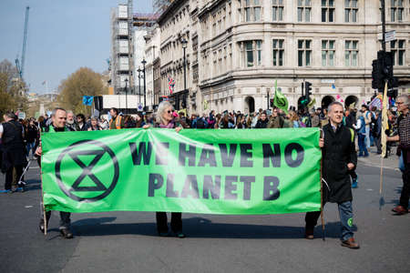 London, United Kingdom, 15th April 2019:- Extinction Rebellion protesters in Parliament Square, protesting about climate change.のeditorial素材