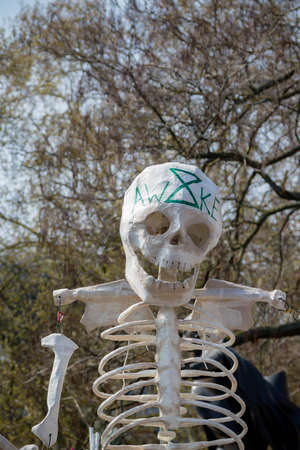 London, United Kingdom, 15th April 2019:- Extinction Rebellion protesters in Parliament Square, hold a funeral for biodiversity loss due to climate changeのeditorial素材
