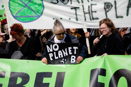London, United Kingdom, 15th April 2019:- Extinction Rebellion protesters in Parliament Square, protesting about climate change.のeditorial素材