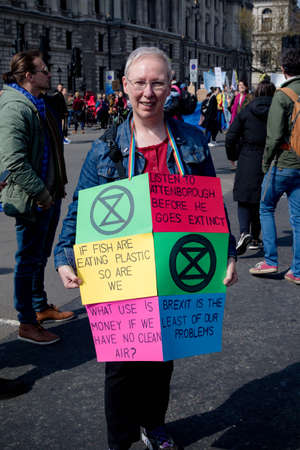 London, United Kingdom, 15th April 2019:- Extinction Rebellion protesters in Parliament Square, protesting about climate change.のeditorial素材