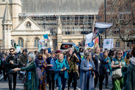 London, United Kingdom, 15th April 2019:- Extinction Rebellion protesters in Parliament Square, protesting about climate change.のeditorial素材