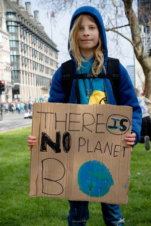 London, United Kingdom, 15th April 2019:- Extinction Rebellion child protester in Parliament Square, protesting about climate change.のeditorial素材