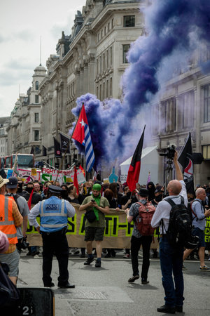 London, United Kingdom, August 3rd 2019:- Anti fascist demonstrators march in opposition to a rally...