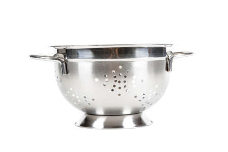 A metal colander isolated on a white backgroundの写真素材