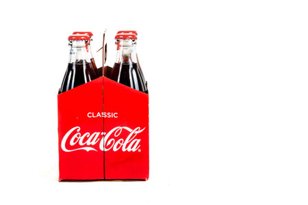 London, United Kingdom, 16th August 2019:- A pack of 4 Coca-Cola glass bottles. Contains 10.6g of...