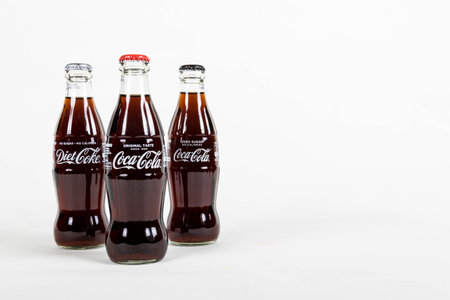 London, United Kingdom, 16th August 2019:- A glass bottle of Diet Coke, Coca-Cola Classic and Coke...