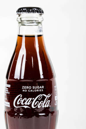 London, United Kingdom, 16th August 2019:- A Coca-Cola zero glass bottle. Coke Zero is sweetened with Aspartame.のeditorial素材