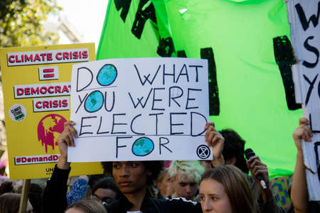 London, United Kingdom, 20th September 2019:- Climate Change Protesters gather in Westminster, central London near the British Parliament as part of a global day of protestのeditorial素材