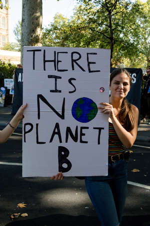 London, United Kingdom, 20th September 2019:- Climate Change Protesters gather in Westminster, central London near the British Parliament as part of a global day of protestのeditorial素材