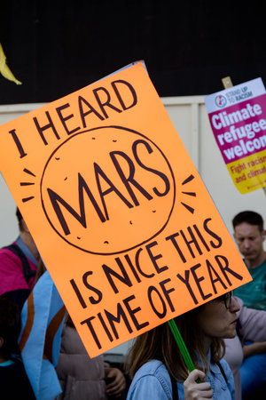 London, United Kingdom, 20th September 2019:- Climate Change Protesters gather in Westminster, central London near the British Parliament as part of a global day of protestのeditorial素材