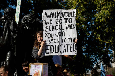 London, United Kingdom, 20th September 2019:- Climate Change Protesters gather in Westminster, central London near the British Parliament as part of a global day of protestのeditorial素材