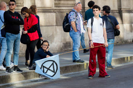 London, United Kingdom, 20th September 2019:- Climate Change Protesters gather in Westminster, central London near the British Parliament as part of a global day of protestのeditorial素材