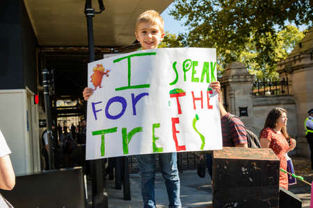 London, United Kingdom, 20th September 2019:- Climate Change Protesters gather in Westminster, central London near the British Parliament as part of a global day of protestのeditorial素材