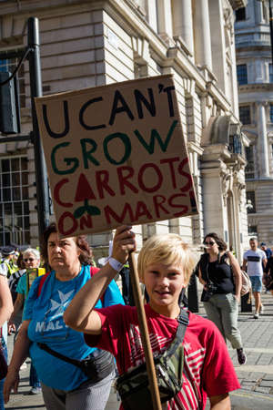 London, United Kingdom, 20th September 2019:- Climate Change Protesters gather in Westminster, central London near the British Parliament as part of a global day of protestのeditorial素材