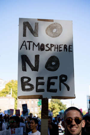 London, United Kingdom, 20th September 2019:- Climate Change Protesters gather in Westminster, central London near the British Parliament as part of a global day of protestのeditorial素材
