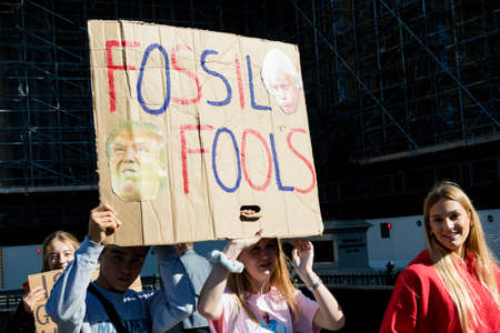 London, United Kingdom, 20th September 2019:- Climate Change Protesters gather in Westminster, central London near the British Parliament as part of a global day of protestのeditorial素材