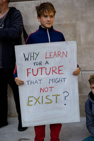 London, United Kingdom, 20th September 2019:- Climate Change Protesters gather in Westminster, central London near the British Parliament as part of a global day of protestのeditorial素材