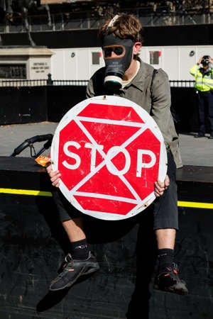 London, United Kingdom, 20th September 2019:- Climate Change Protesters gather in Westminster, central London near the British Parliament as part of a global day of protestのeditorial素材