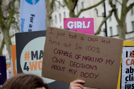 London, United Kingdom, March 8th 2020:- People take part in the March For Women hosted by Care Internationalのeditorial素材