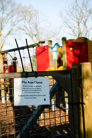 Sandhurst, United Kingdom, 9th April 2020:- Signs explaining the closure of a play park on advice from the British Government due to the Covid-19 outbreakのeditorial素材