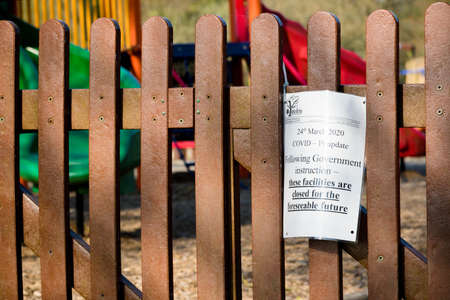 Yateley, United Kingdom, 9th April 2020:- Signs explaining the closure of a play park on advice from the British Government due to the Covid-19 outbreakのeditorial素材