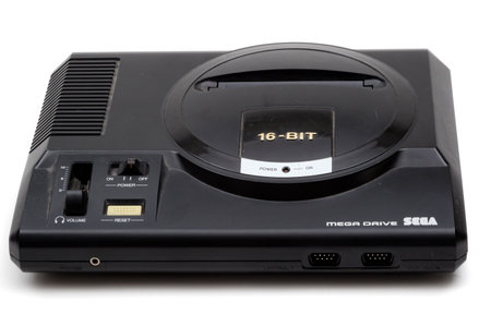 London, United Kingdom, 21st September 2020:- A retro Sega Mega Drive 16-bit gaming console isolated...