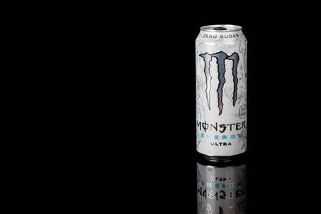 London, United Kingdom, 14th October 2020:- A can of Monster Zero Sugar Ultra Energy Drink Isolated on a black backgroundのeditorial素材