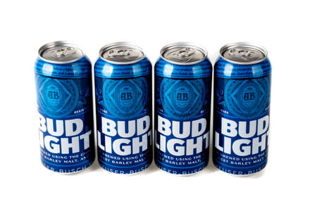 Sandhurst, United Kingdom; February 13th 2021:- Four cans of Bud Light isolated on a white backgroundのeditorial素材