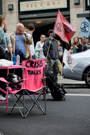 London, United Kingdom, 21st August 2021:- Members of Extinction Rebellion take part in a protest in central Londonのeditorial素材