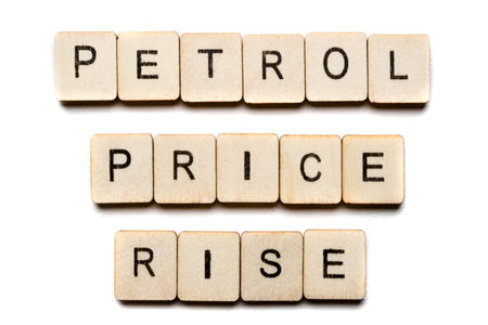 Concept on the War in Ukraine showing a sign reading Petrol Price Rise