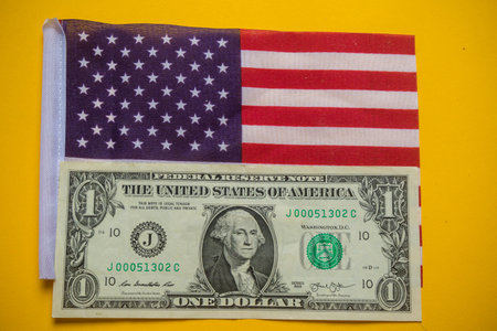 A United States One Dolalr Bill and US Flagの写真素材