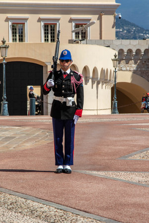 Monte-Ville, Monaco, April 21st 2023:- A member of the Compagnie des Carabiniers du Prince standing sentry outside the Palace in Monacoのeditorial素材