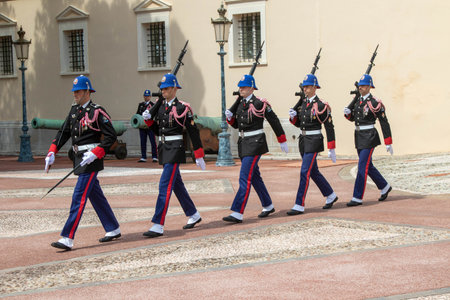 Monte-Ville, Monaco, April 21st 2023:- Members of the Compagnie des Carabiniers du Prince during the changing of the guard ceremony, performed daily at 11:55amのeditorial素材